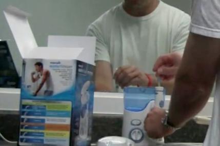 Como usar um irrigador oral - Waterpik - Passo 3